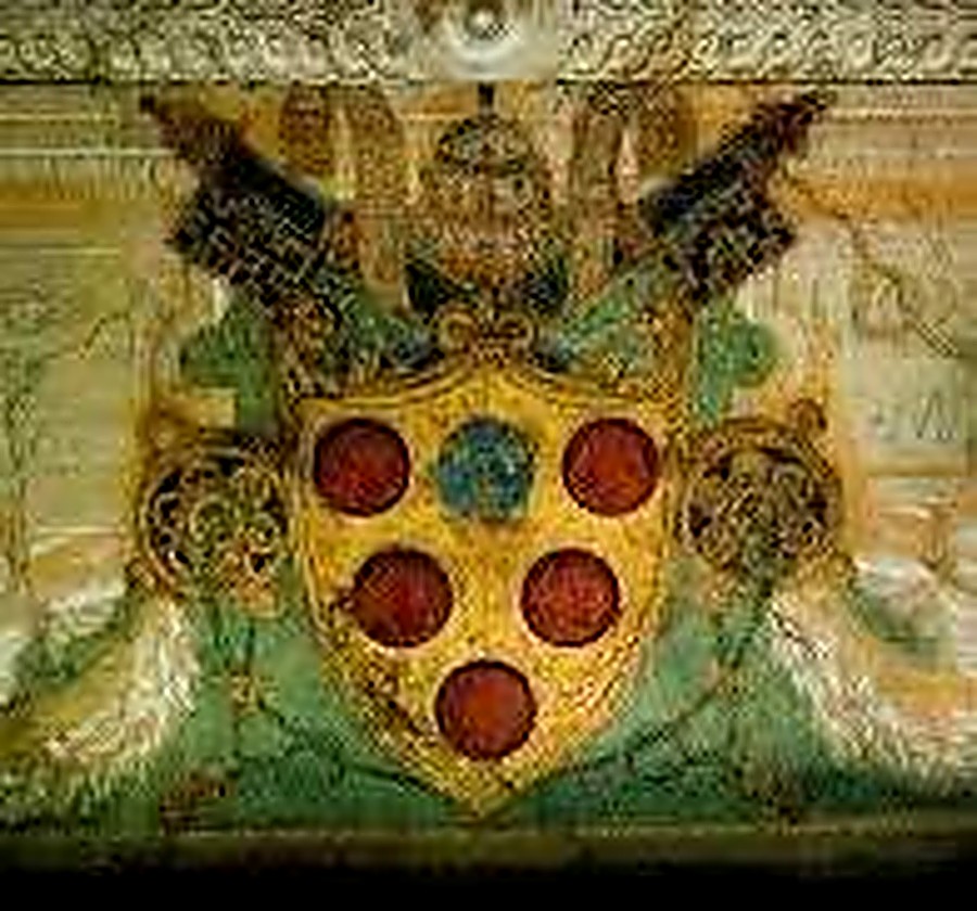 A historical fresco of a Medici coat of arms, showing the red palle on a gold shield beneath a papal galero and crossed keys